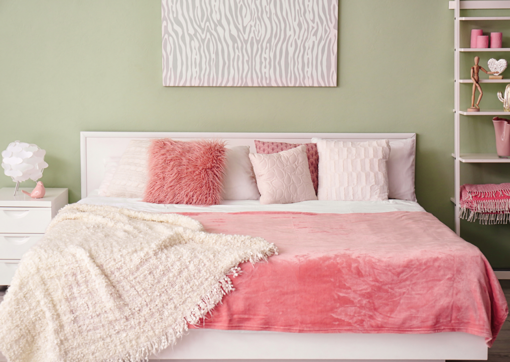 Textured Bedding In Pink With Fluffy Throw And Fluffy Pink Pillows