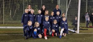 fleet girls football team sponsored by local cleaners in Fleet Haus Maids