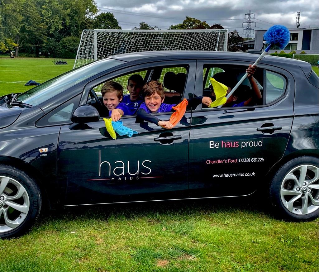 AFC Stoneham Players in Haus Maids Car